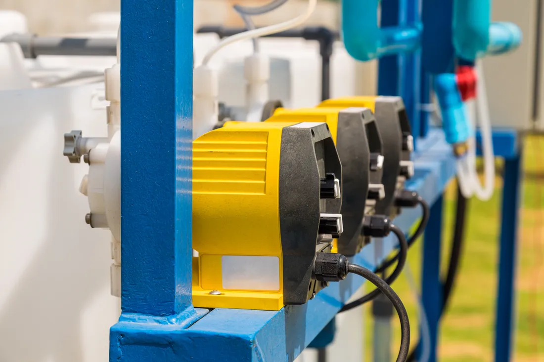 Chemical dosing pumps mounted on a dosing skid